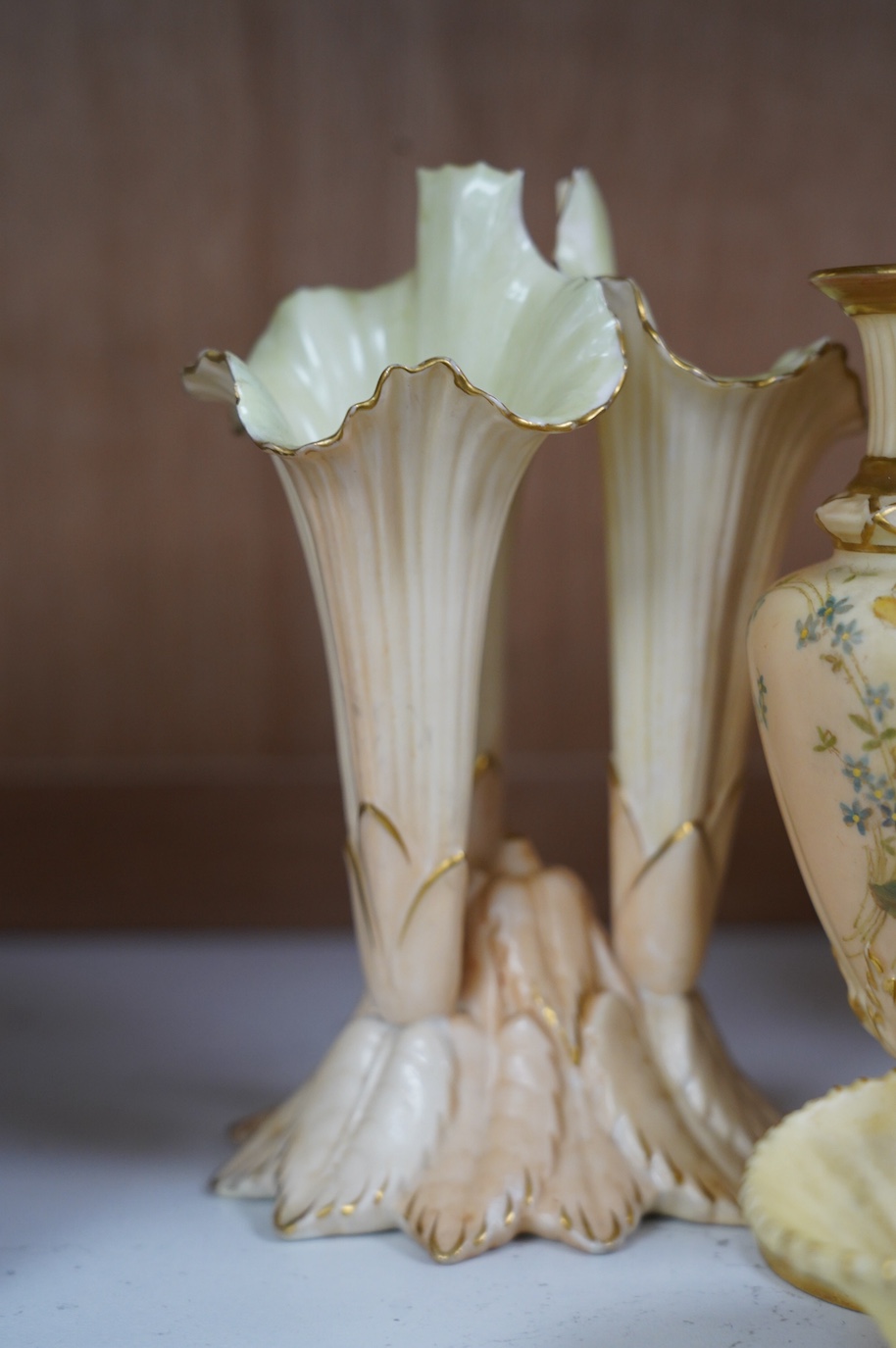 A pair of Worcester vases, shape number 1730, a pair of similar baskets and a pair of Locke & Co. Worcester vases, tallest 16cm. Condition - fair to good, one Locke & Co. vase has a small hairline crack, wear to gilding